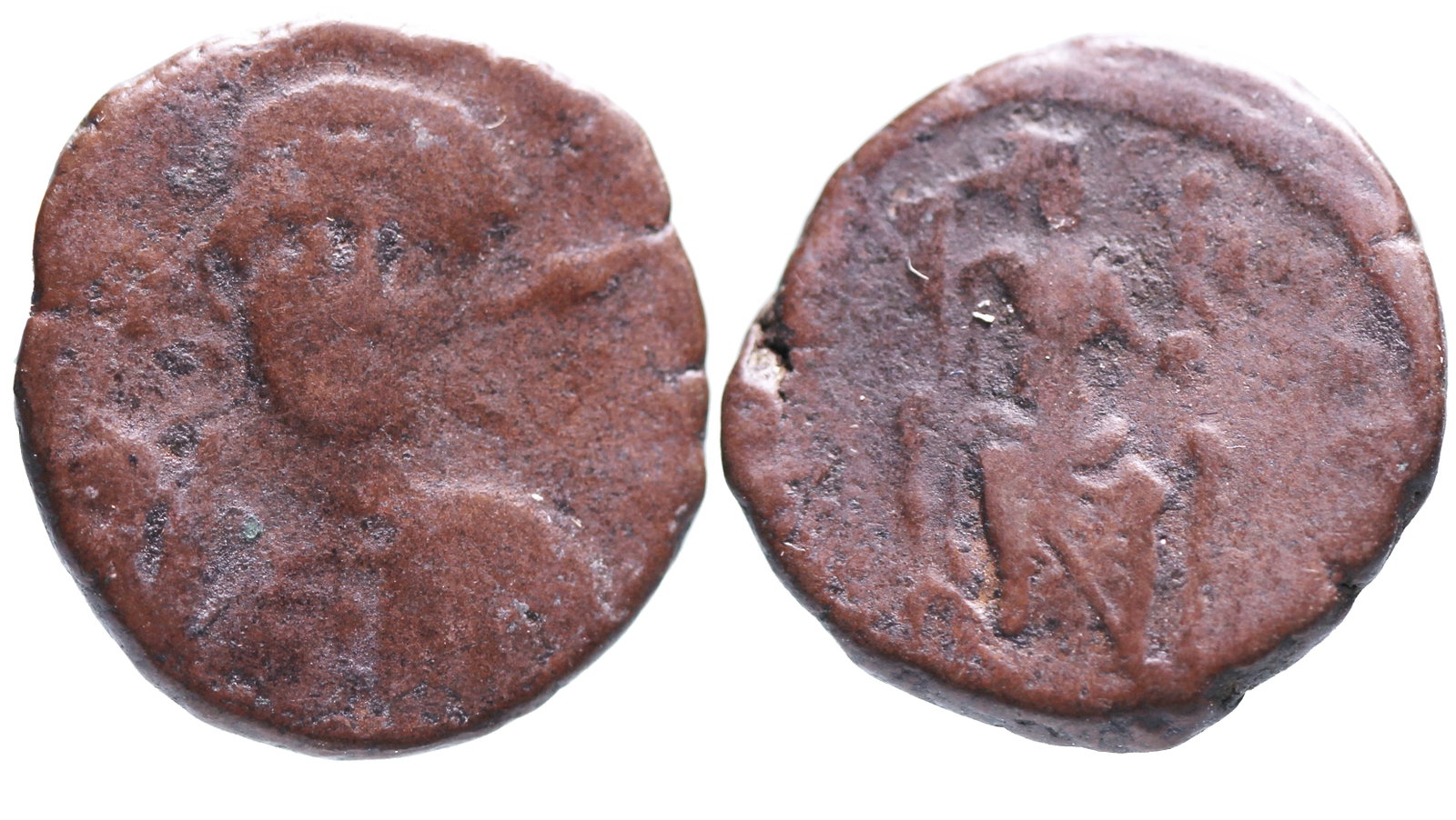 Theodosius II 402-450 AD: Bronze, 14 mm, 2.50 gm.Obv: Bust of Theodosius facing Constantinopolis seated.Rev: Constantinople seated holding a spear and victory.