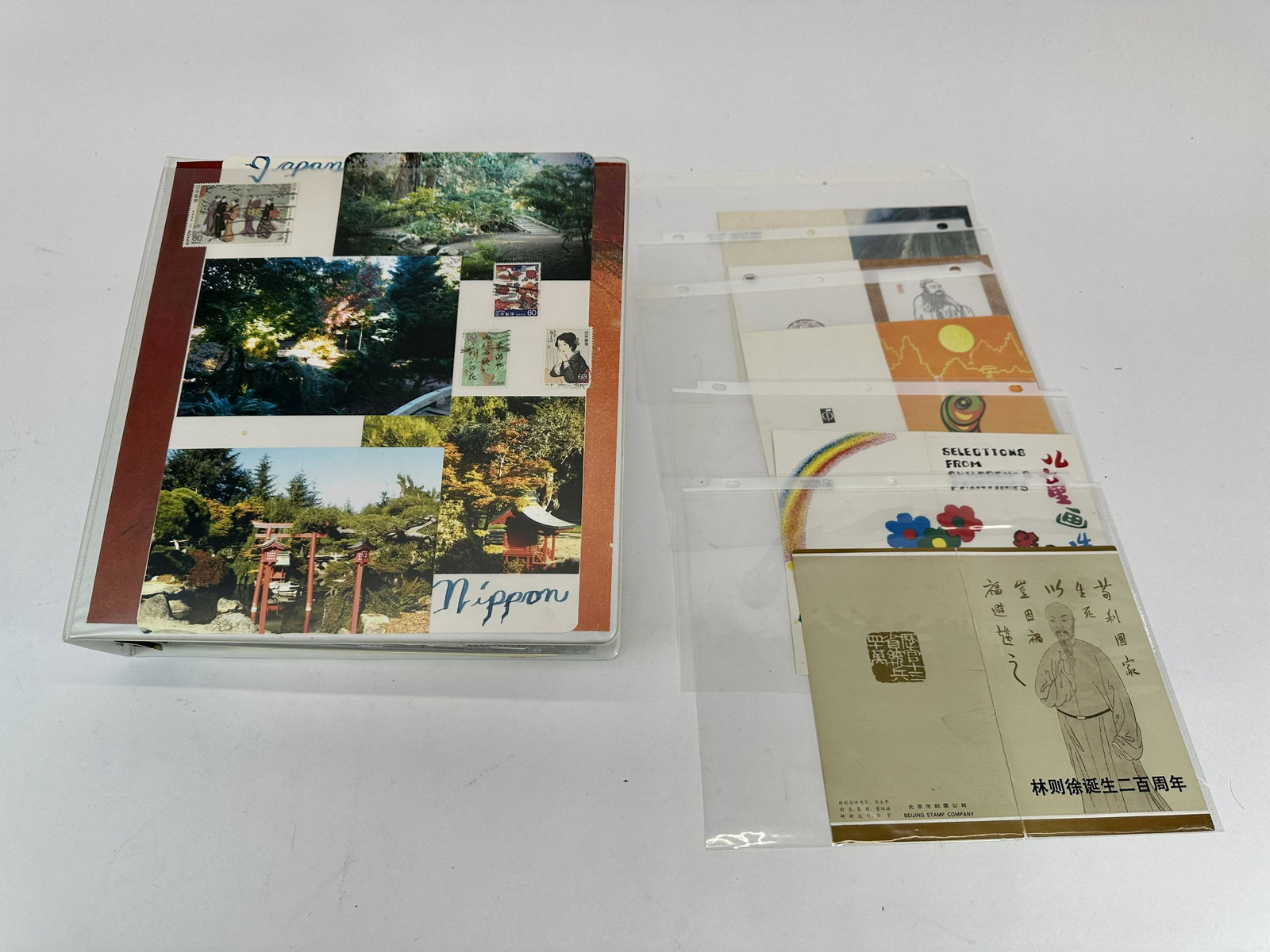 Nippon Japan Yen & Stamp Collection: This lot features (1) Binder with Nippon Japan Yen, Postcards and Stamps. Dates range back to the early 1900's. Condition Varying Conditions