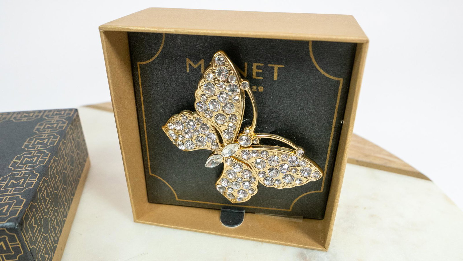 Monet Butterfly Brooch: Description This lot features (1) Butterfly Brooch made by Monet. This fashion jewelry piece is brand new in the box. Size 2"L X 1.5"H Condition Good Condition