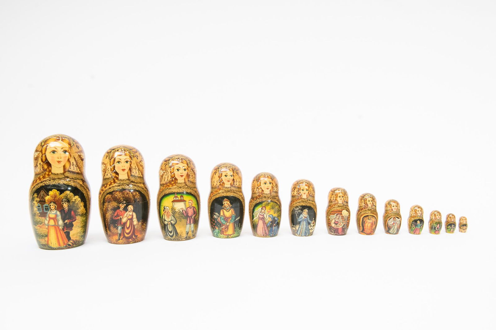 Heirloom 17-Dolls Russian Nesting Doll: This lot features (1) large antique Heirloom Russian Nesting Doll. Markings in Russian underneath shown in photos. Includes 17 dolls inside! Signed underneath, B.N Ceprueb Posad. Size 14''T, 6''Diamet