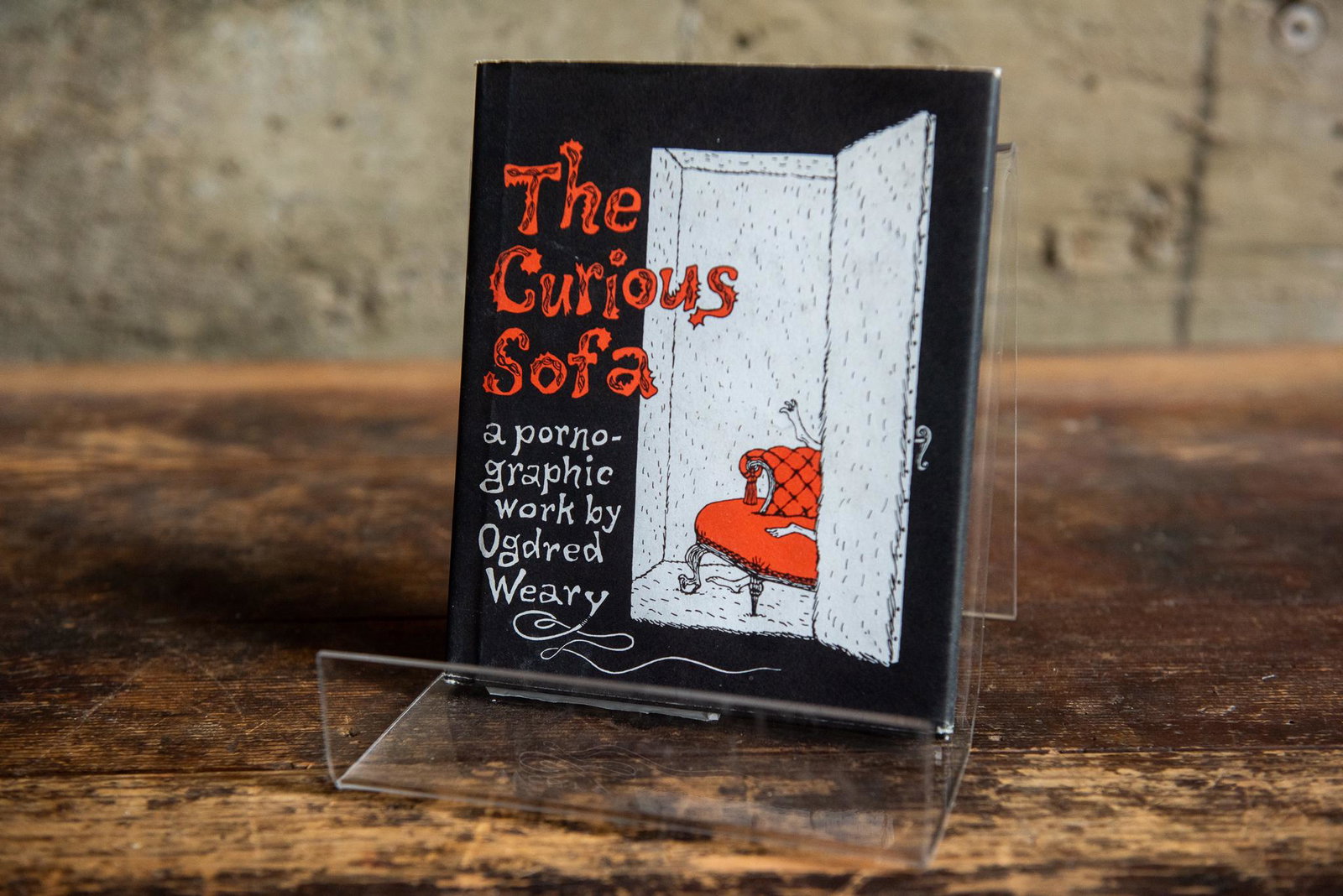 LIMITED EDITION: THE CURIOUS SOFA, A PORNOGRAPHIC WORK BY OGDRED WEARY #2: Limited edition: The Curious Sofa, A Pornographic work by Ogdred Weary. Edition 83/212. Hardcover with dust jacket. "Ogred Weary" is an anagram to Edward Gorey. Condition Good Condition.