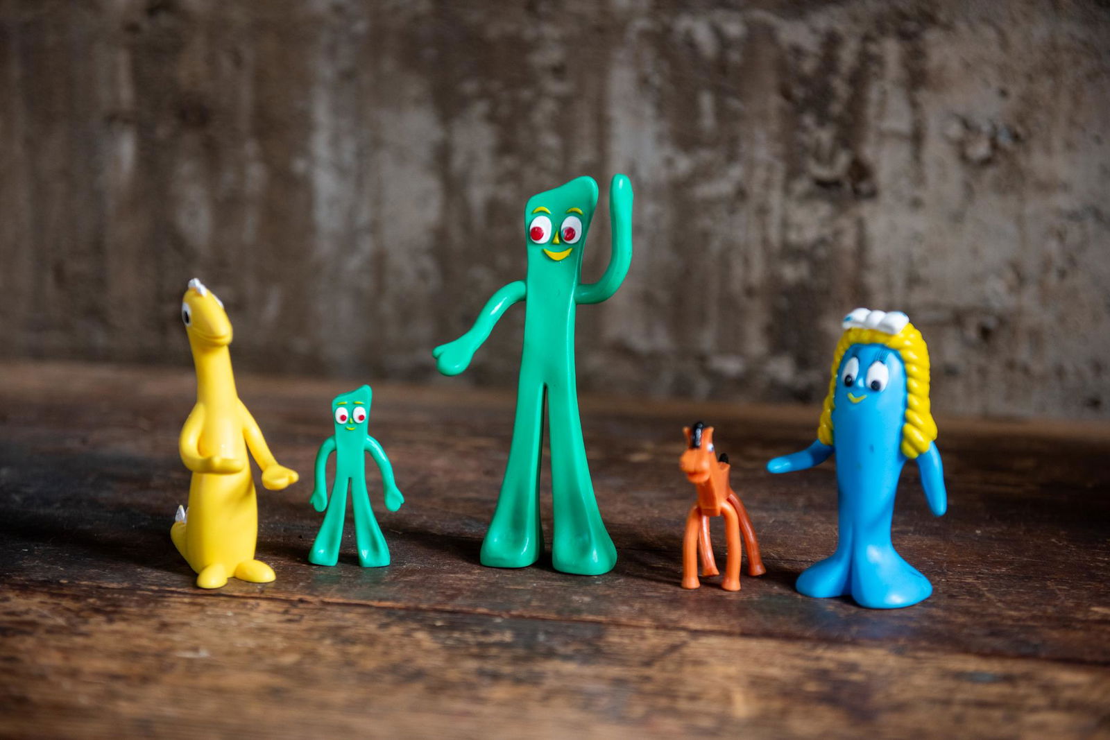 VINTAGE GUMBY TOYS: Assorted vintage Gumby toys. Condition Various conditions.