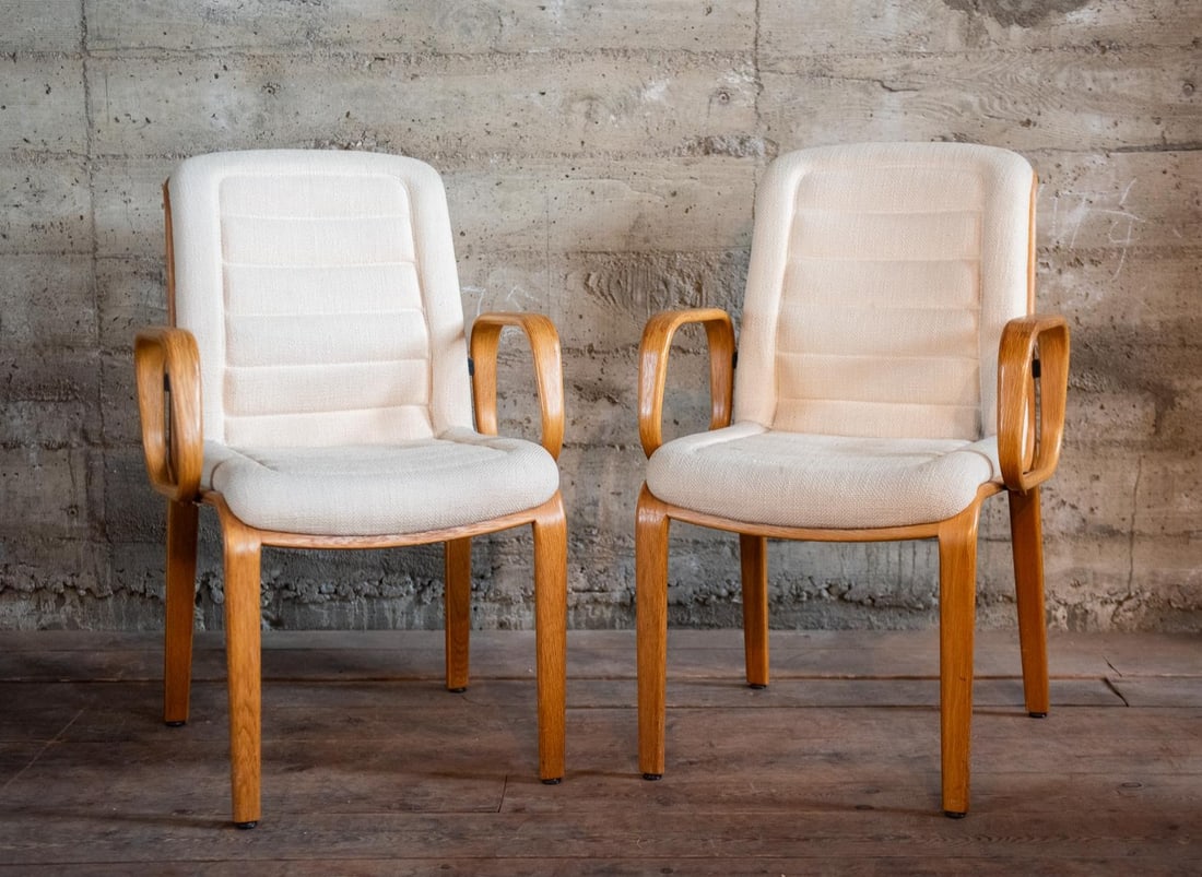 BILL STEPHENS MID-CENTURY CHAIRS: Two chairs believed to be designed by Bill Stephens with a beige fabric. Size 36"H 24"W 23"D Condition Good condition.
