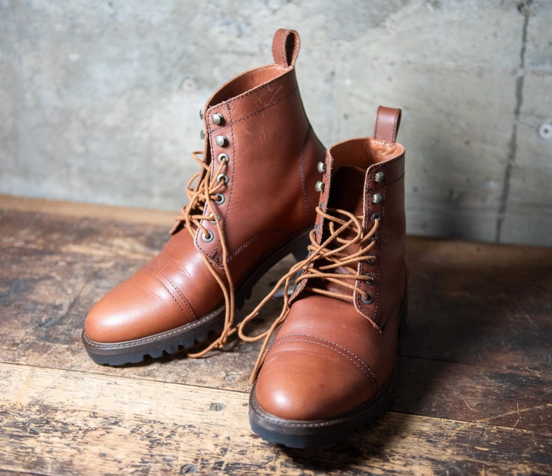 PORTLAND LEATHER COMPANY BOOTS: Brown leather boots made by Portland Leather Company, Portland, Oregon. These boots are 11 and show one "defect" on the boot pull, shown in photos. Size Size 11 Condition Good condition. See photos.