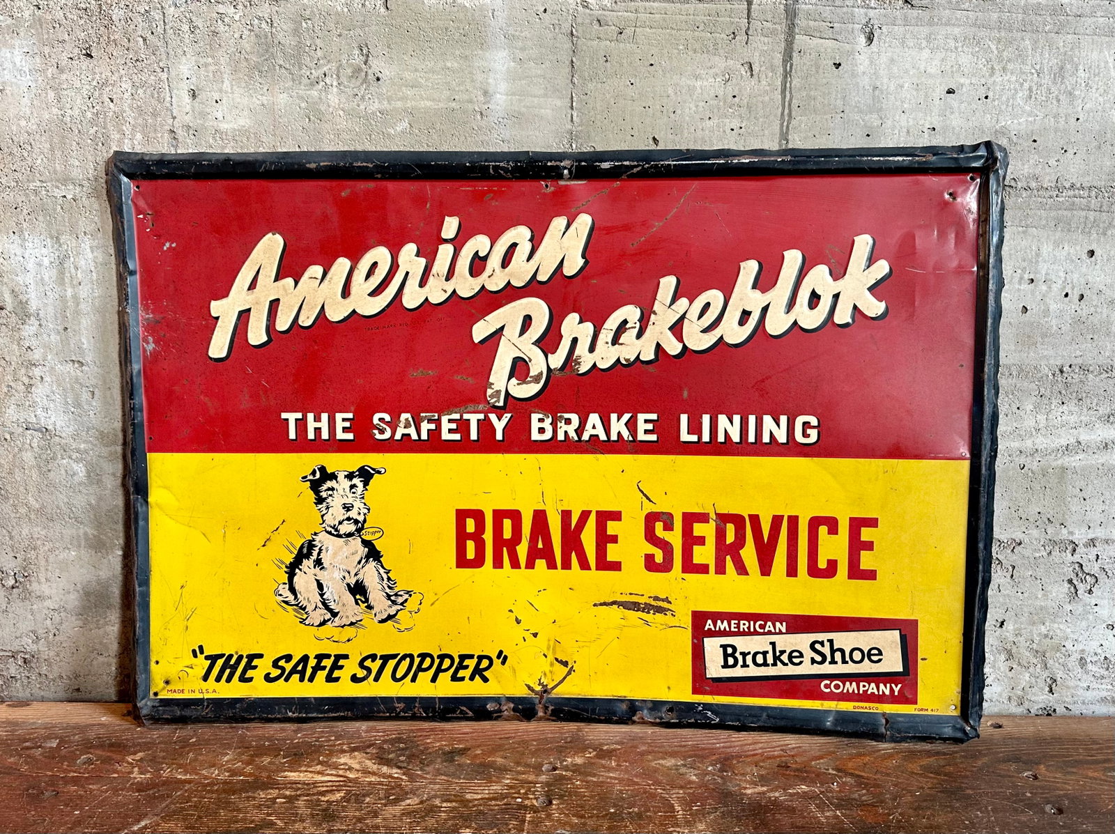 AMERICAN BRAKEBLOK SIGN: American Brakeblok single sided metal sign by Donasco. "The Safe Stopper" Rare American Brakeblok Flange Sign, American Brakeblok brand, leader for heavy equipment brake market has provided for more t