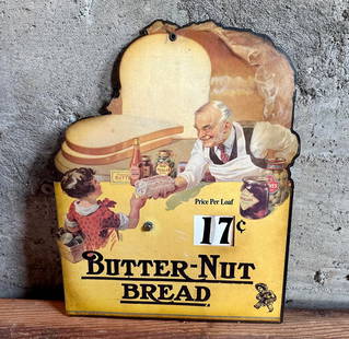 BUTTER-NUT BREAD CARDBOARD SIGN: Butter-Nut Bread single sided cardboard sign. Bottom left corner reads, "Form No.23 Printed in USA". Price numbers slide on the back and are adjustable. During the 1920s and ’30s, much of the