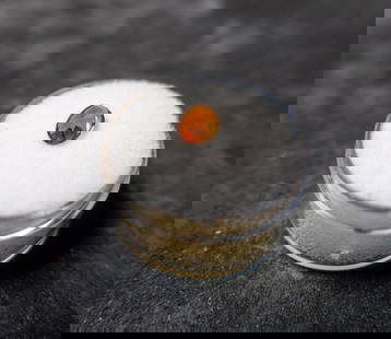 .79 CT. GARNET: An oval shaped Hessonite Garnet. 5x7 mm. .79 ct.ConditionGood condition.