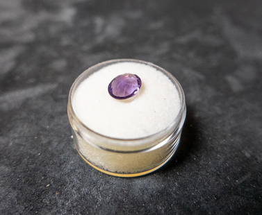 1.49 CT. AFRICAN ROSE AMETHYST: An oval shaped African Rose Amethyst. AAA quality gemstone. 7x9 mm. 1.49 ct.ConditionGood condition.
