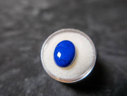 7.66 CT. LAPIS LAZULI: An oval shaped Lapis Lazuli stone. 12x16 mm. 7.66 ct.ConditionGood condition.
