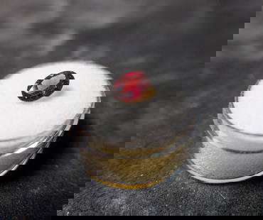 1.45 CT. RHODOLITE GARNET: An oval cut Rhodolite Garnet. 6x8 mm. 1.45 ct.ConditionGood condition.