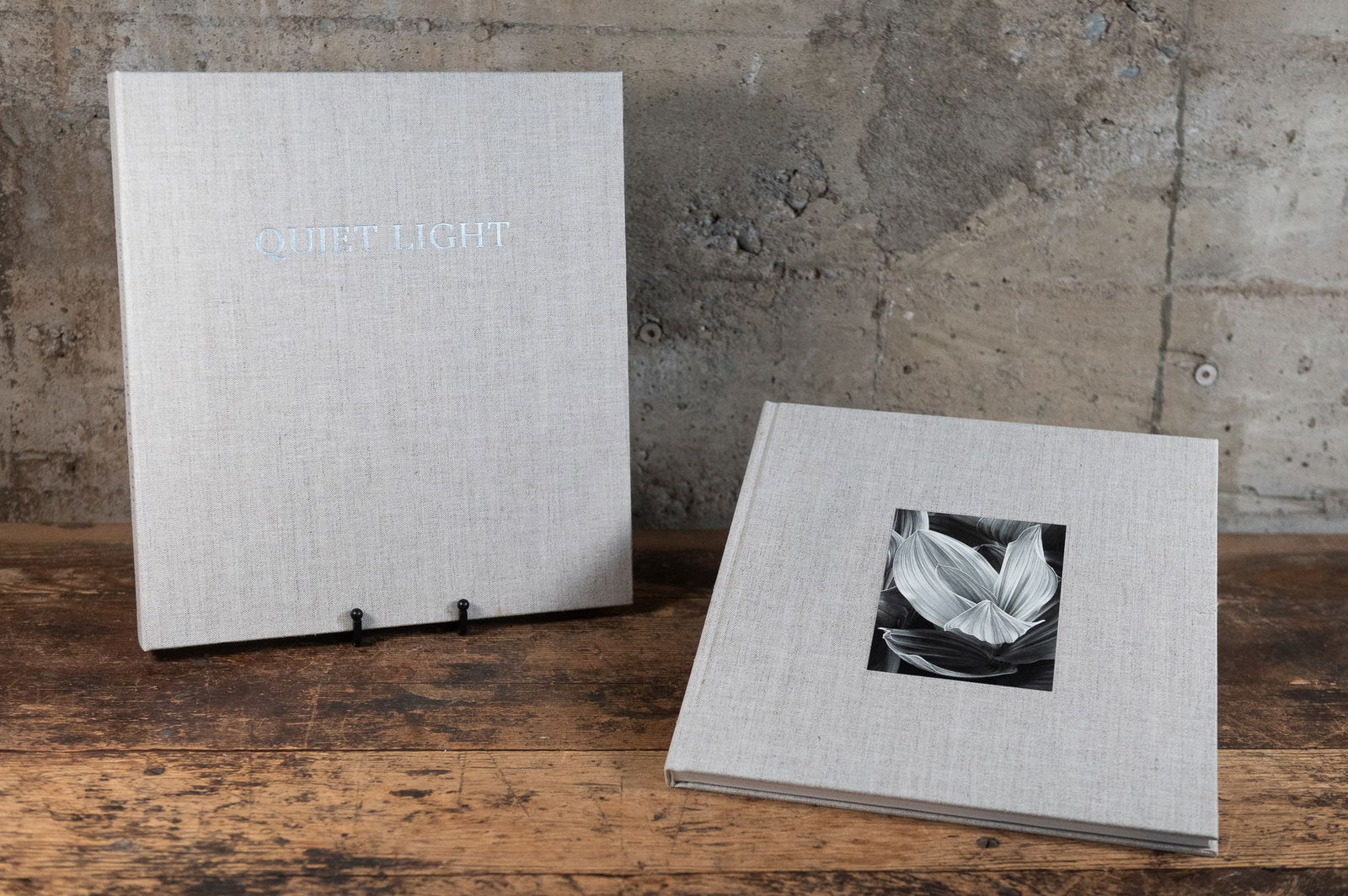 JOHN SEXTON, "QUIET LIGHT" DUAL-SIGNED LIMITED EDITION BOOK: "Quiet Light" a dual-signed limited edition hardcover book and sleeve. Includes two signatures: listed photographer John Sexton, and a signature from author/writer Colin Fletcher. Sexton numbered the