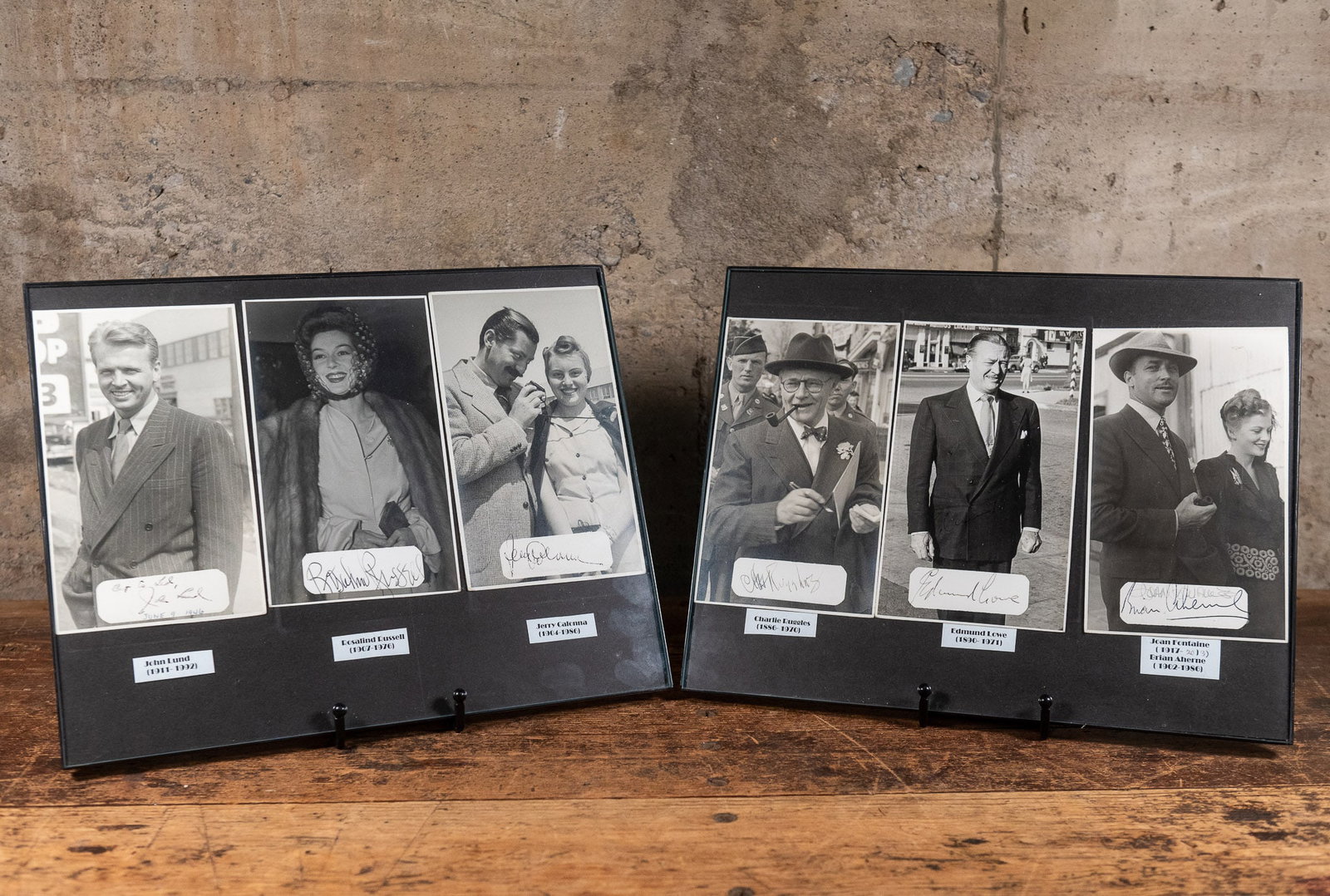 AUTOGRAPHED PHOTO COLLECTION, 7 ACTORS & ACTRESSES: A collection of autographed photographs of Hollywood actors and actresses in frames, including John Lund, Rosalind Russell, Jerry Calonna, Charlie Ruggles, Edmund Lowe, Joan Fontaine, and Brian Aherne