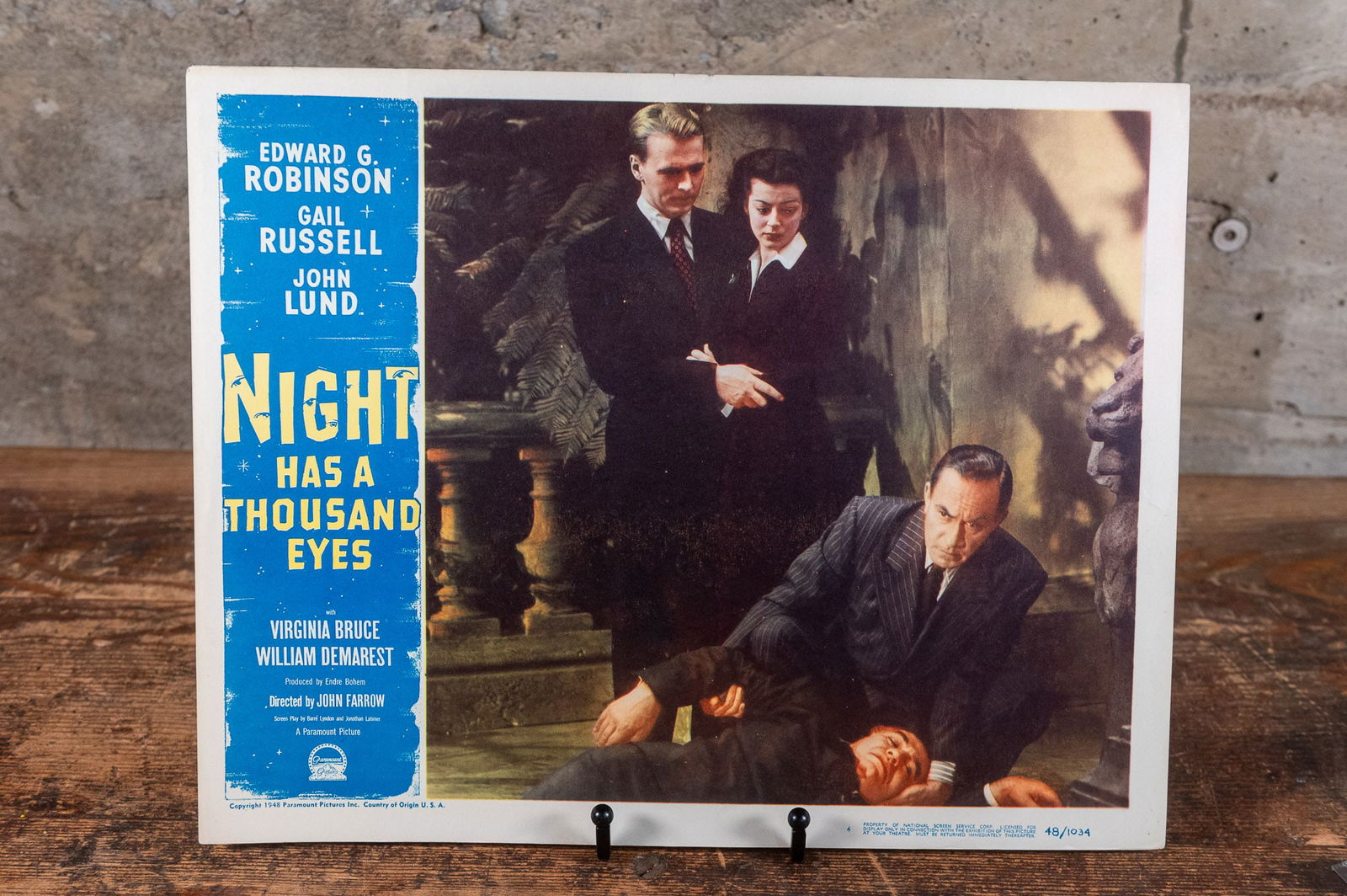 'NIGHT HAS A THOUSAND EYES' LOBBY CARDS: A set of six lobby cards for the film "Night Has a Thousand Eyes" starring Edward G. Robinson. Each lobby card measures 11"x14".