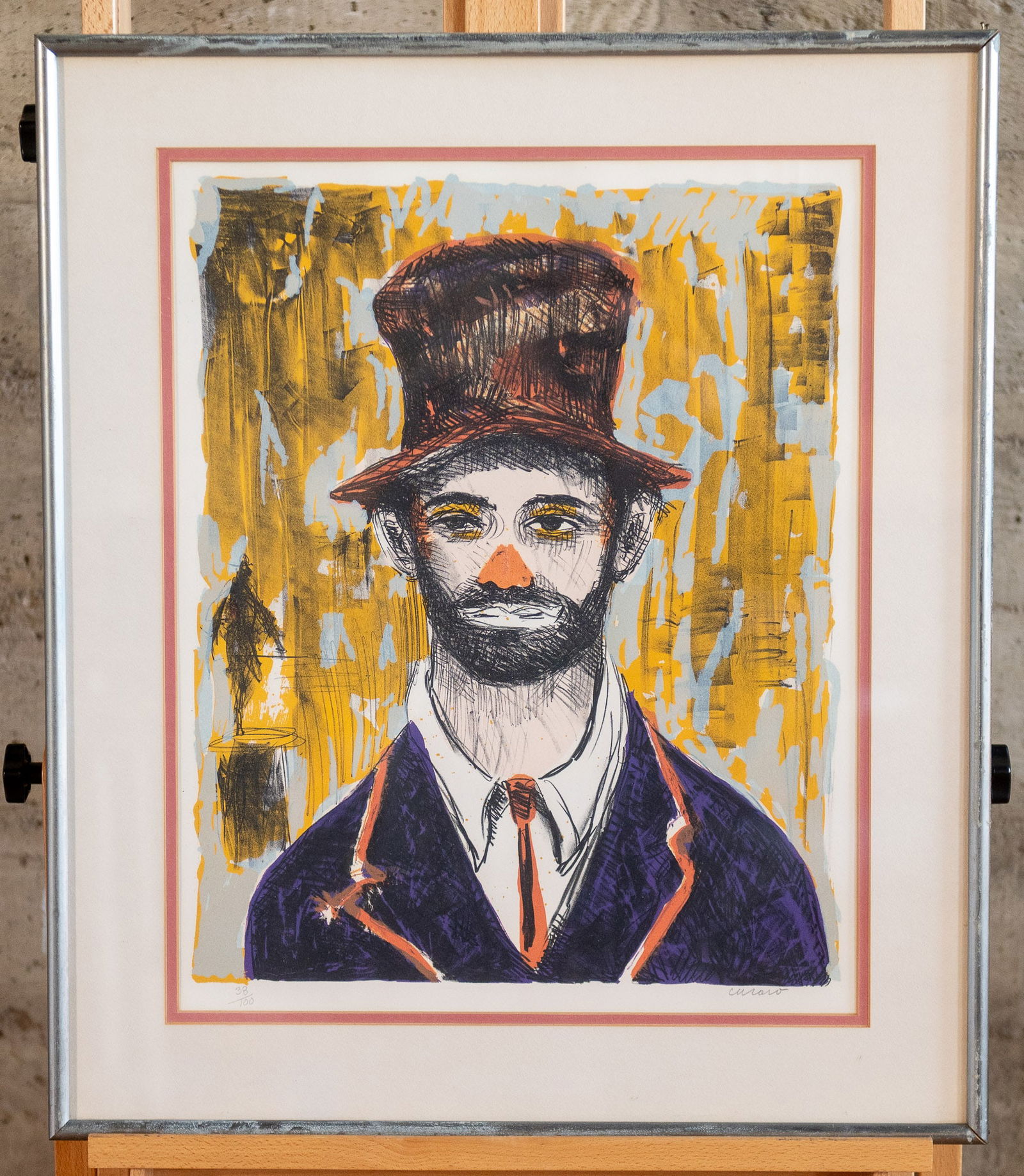 PASCAL CUCARO 'CLOWN WITH RED NOSE': "Clown with Red Nose" a color lithograph by listed artist Pascal Cucaro. Hand signed in the bottom right by the artist. Numbered in the bottom left 38/100. Measures in the frame 27.75" H x 23.75" W. C