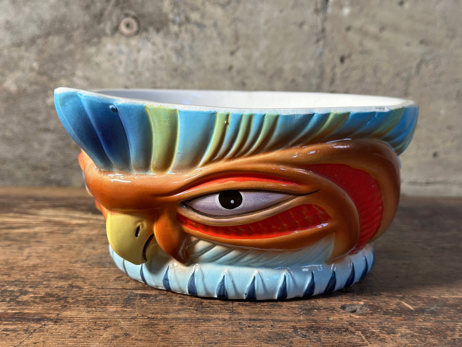 'HYPNOTIC CHICKEN' TIKI BOWL, STEVE CRANE: A "Hypnotic Chicken" Tiki Bowl designed by Gabe Florian for Steve Crane's restaurant the Luau in Beverly Hills and the Kon-Tiki restaurants in the Sheraton Hotels. Circa 1950's. Stamped on the bottom 