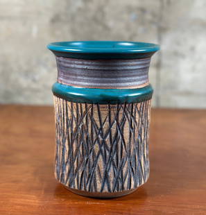 VICTORIA LITTLEJOHN, STUDIO POTTERY VASE #1: A studio pottery vase by listed artist, Victoria Littlejohn. Signed on the bottom and measures 7.75'' H x 5.75'' W x 5.75'' D. Victoria Littlejohn produced both production and one-of-a-kind work. Her