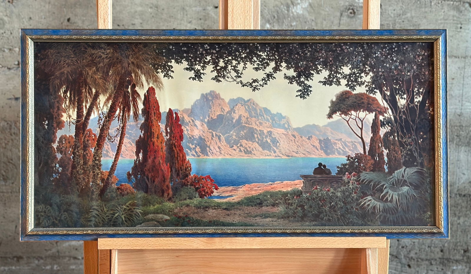 ART DECO FRAMED PRINT, IN THE STYLE OF MAXFIELD PARRISH: This lot features a beautiful antique Art Deco print, housed in wood frame under glass, in the style of artist Maxfield Parrish. This artwork measures in the frame, 15.5'' H x 30.5'' W.