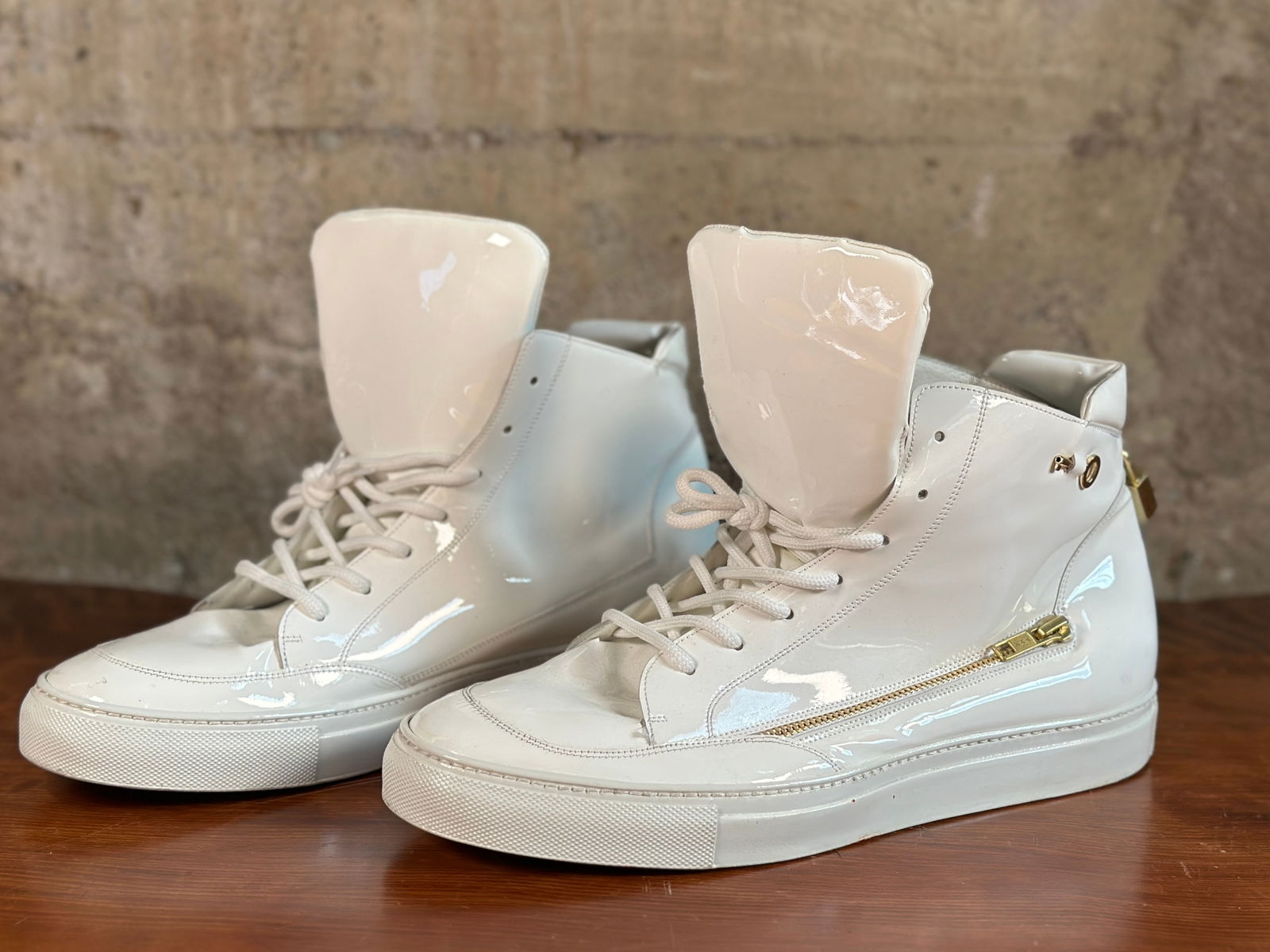 MAURI CUSTOM EXOTIC SNEAKERS: A pair of custom exotic sneakers, manufactured by Mauri in Italy. In a size 9, with a rubber sole, genuine leather, and custom gold tone zippers/ornaments. Mauri is one of the trend setters left in th