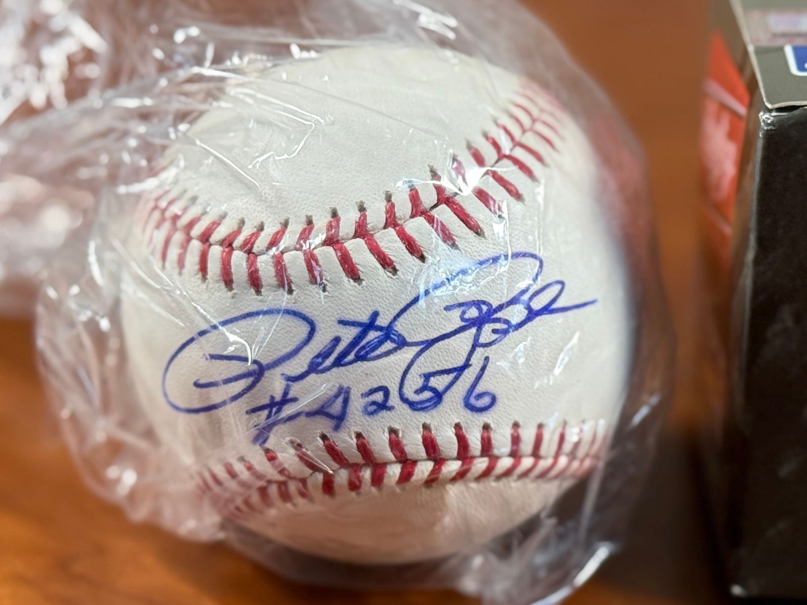 PETE ROSE SIGNED BASEBALL: A signed baseball by American baseball player and manager, Pete Rose. Peter Edward Rose Sr., nicknamed "Charlie Hustle", was an American professional baseball player and manager. He played in Major Le