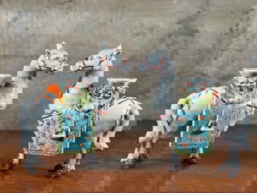 PAIR OF CHINESE HORSE CANDLE HOLDERS