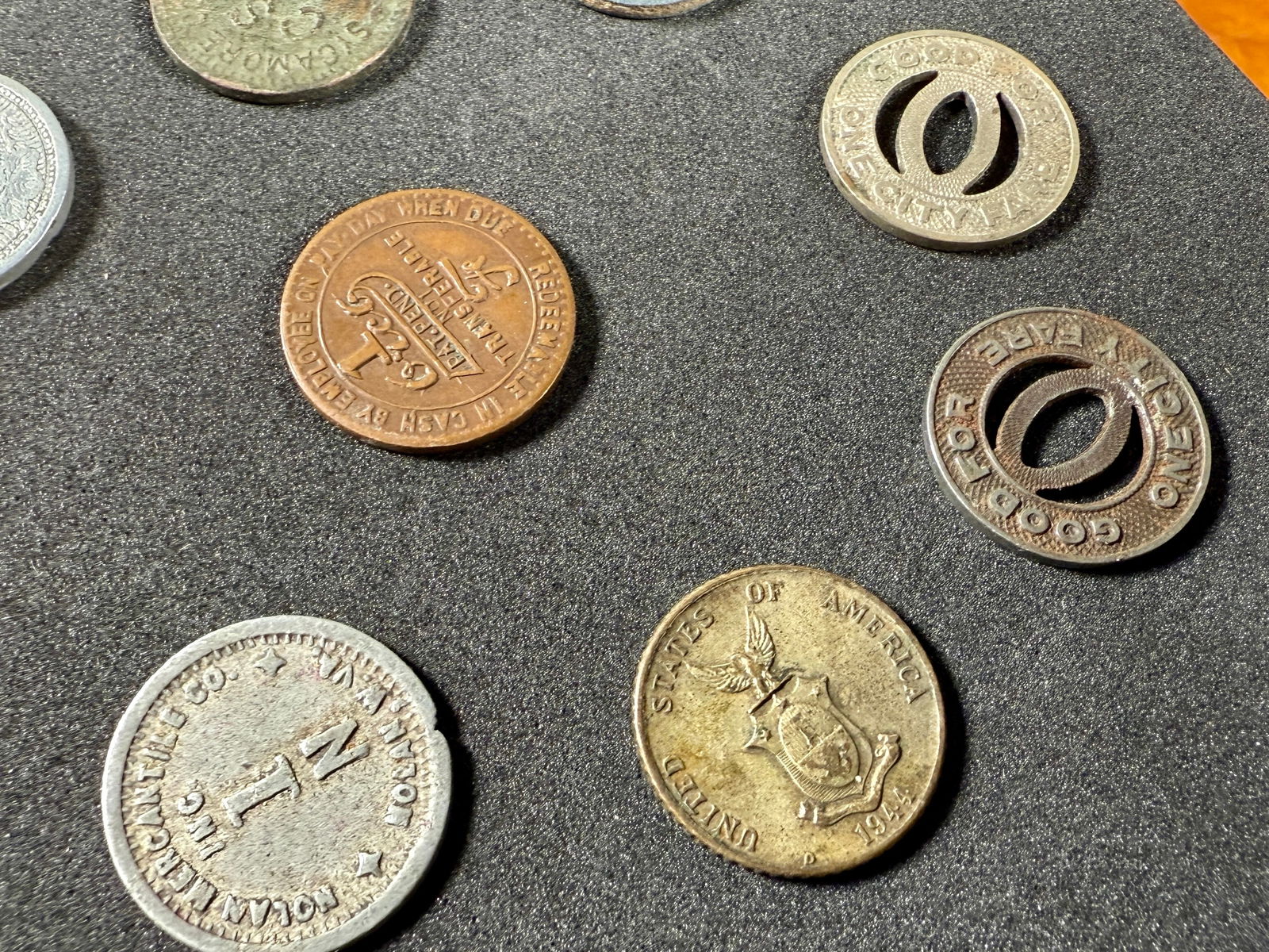 COAL SCRIP COLLECTION: This lot features a unique set of coins that are believed to be Coal scrip. There are eight (8) in total. Coal scrip, a form of company-issued currency, was widely used in American coal towns, particu