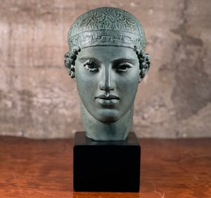 PATINATED PLASTER HEAD OF THE CHARIOTEER OF DELPHI