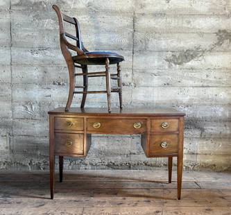 ENGLISH MAHOGANY DESK & CHAIR: This lot features an English Mahogany ladies or children's desk &amp; chair measuring, 27'' H x 42'' W x 19'' D. This desk has solid wood construction and dove tailed drawers. The chair is a tad tall