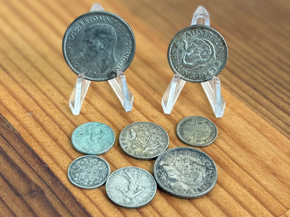 FOREIGN COINS WITH SILVER CONTENT: This lot features an assortment of foreign coins, all with silver content.