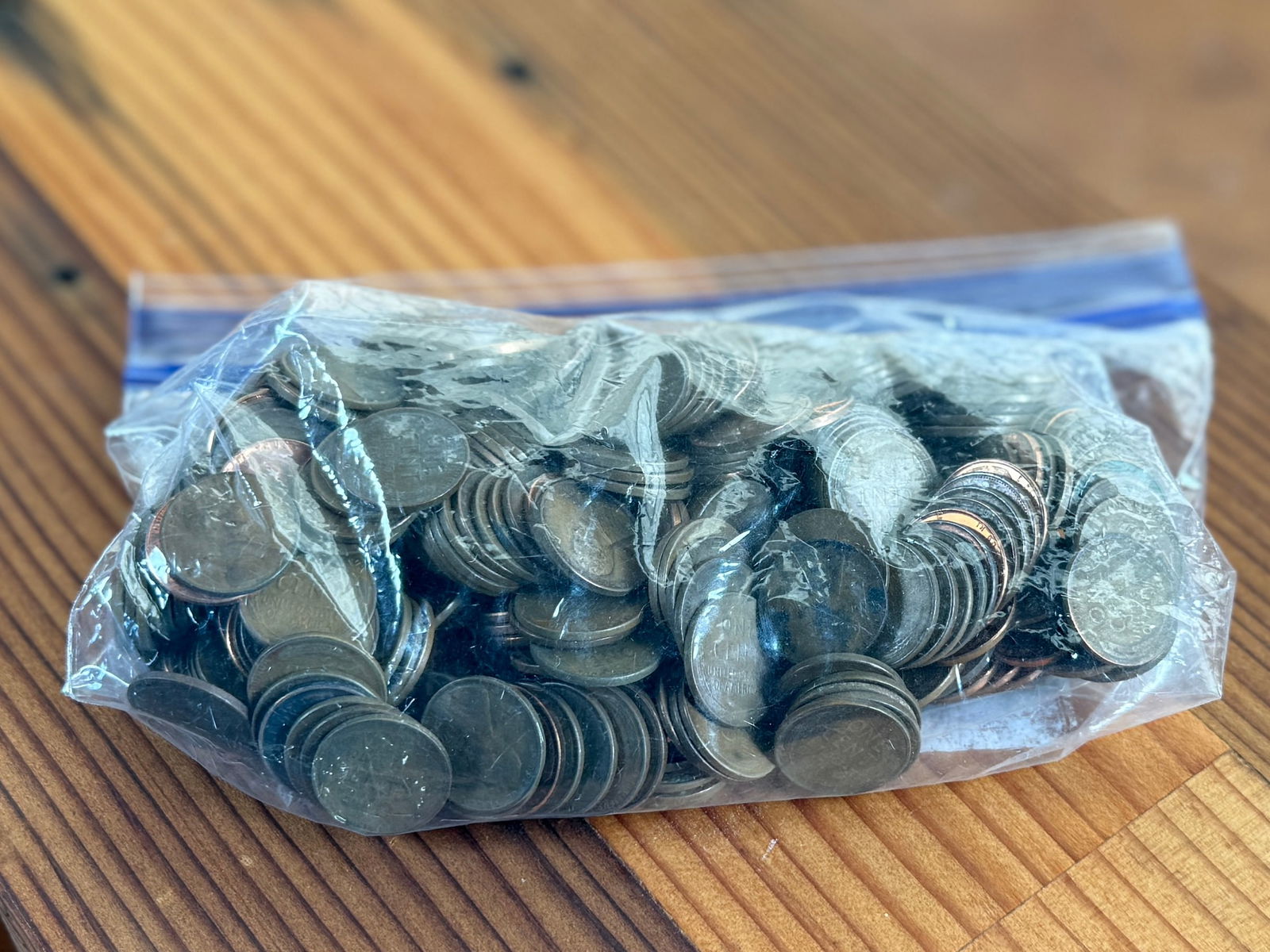 WHEAT PENNY COLLECTION: This lot features a large bag containing 350 wheat pennies.