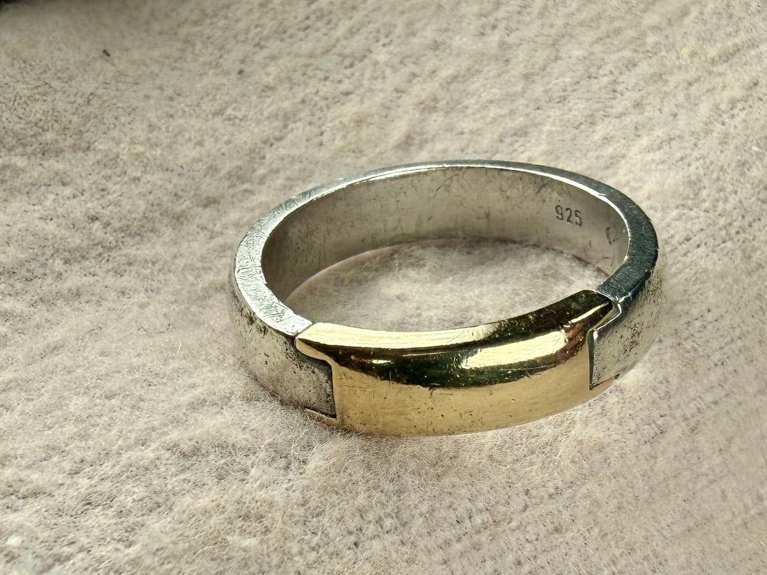 14K GOLD & STERLING SILVER RING: This lot features a vintage hand-crafted ring made with sterling silver and 14k gold in a size 8.5 with a total approx. weight of 6.00 grams.
