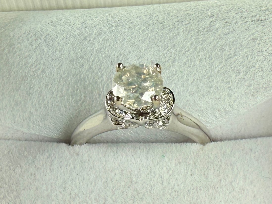 14K GOLD & DIAMOND ENGAGEMENT RING #2: This lot features a 14k gold & diamond ring in a size 7 with a total approx. weight of 3.21 grams. Diamond tests as genuine.
