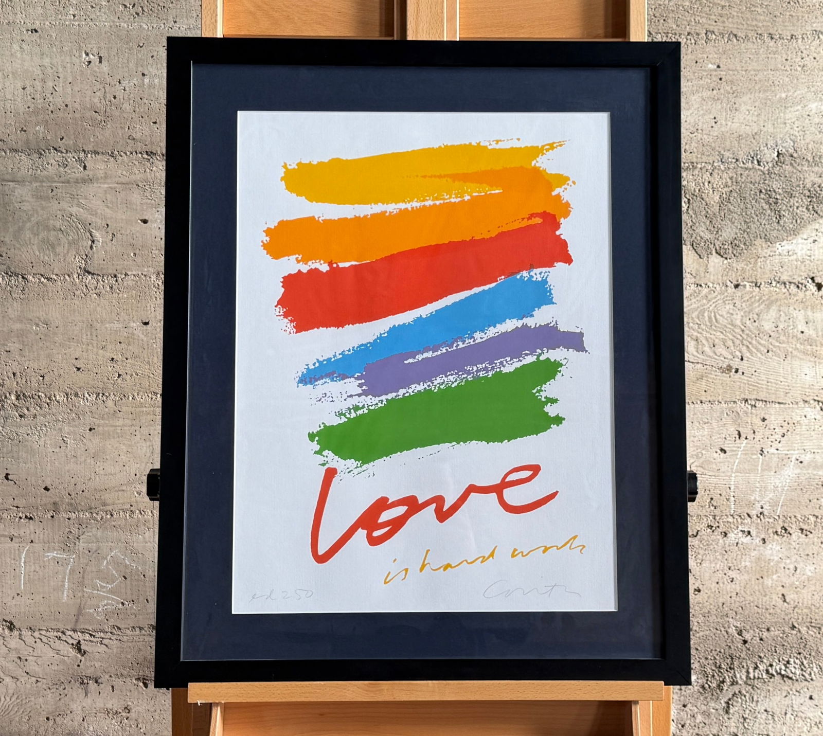 CORITA KENT, 'LOVE IS HARD WORK': "Love is Hard Work", a limited edition screen print by listed artist, Corita Kent. From an edition of 250 and signed lower right in pencil by Kent. Professionally framed and measures in