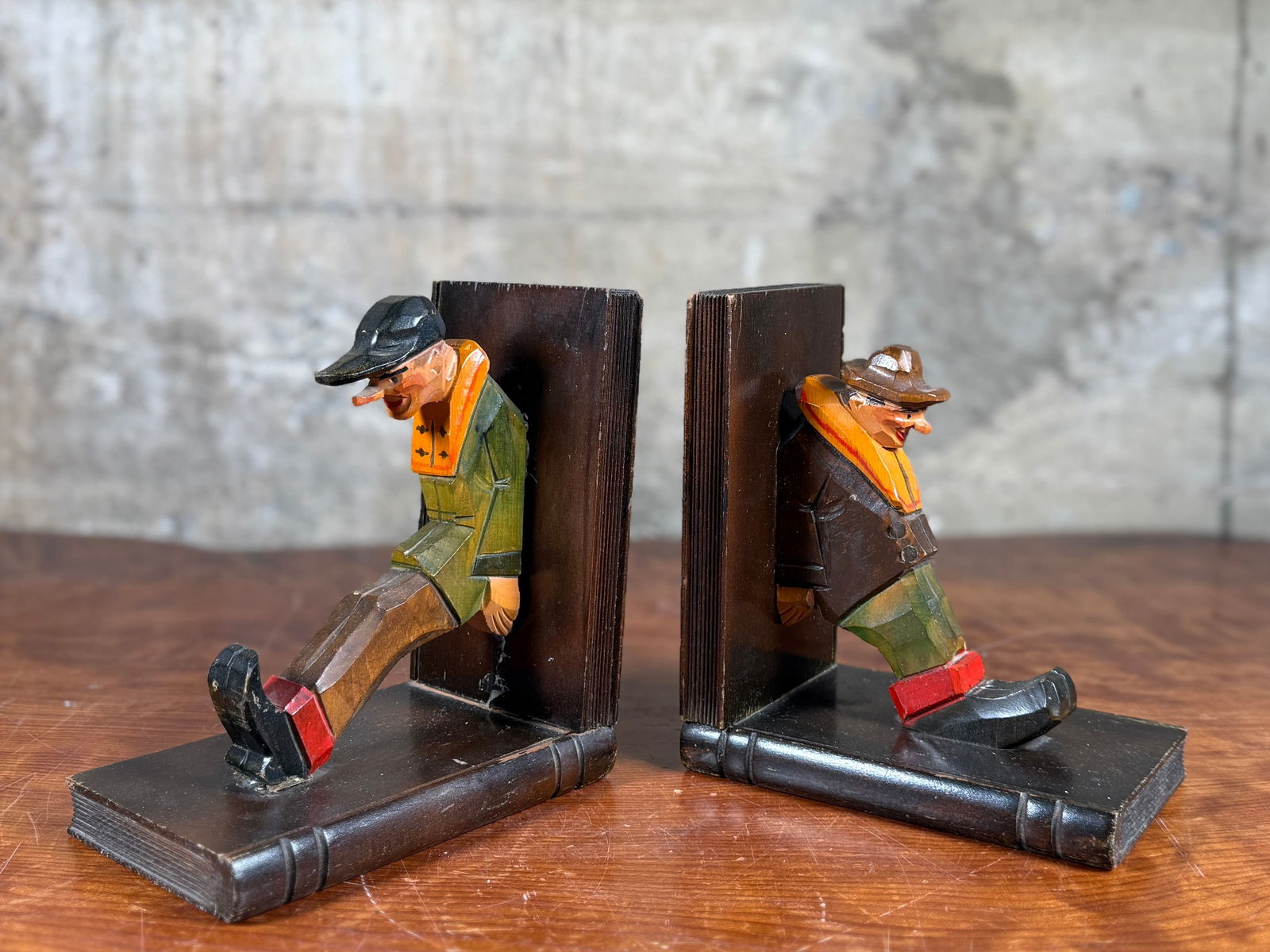 RHON SEPP, FOLK ART BOOKENDS: This lot features a pair of vintage folk art style bookends manufactured in Germany by Rhon Sepp.