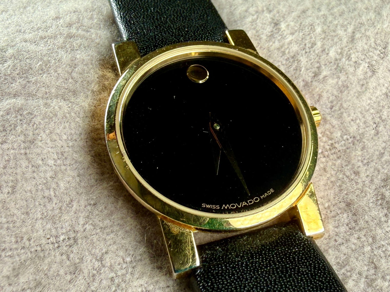 MOVADO, QUARTZ WATCH #2: This lot features a vintage Movado quartz watch with a sapphire crystal and a 25mm case. Service history unknown and will need a battery at the minimum to run.
