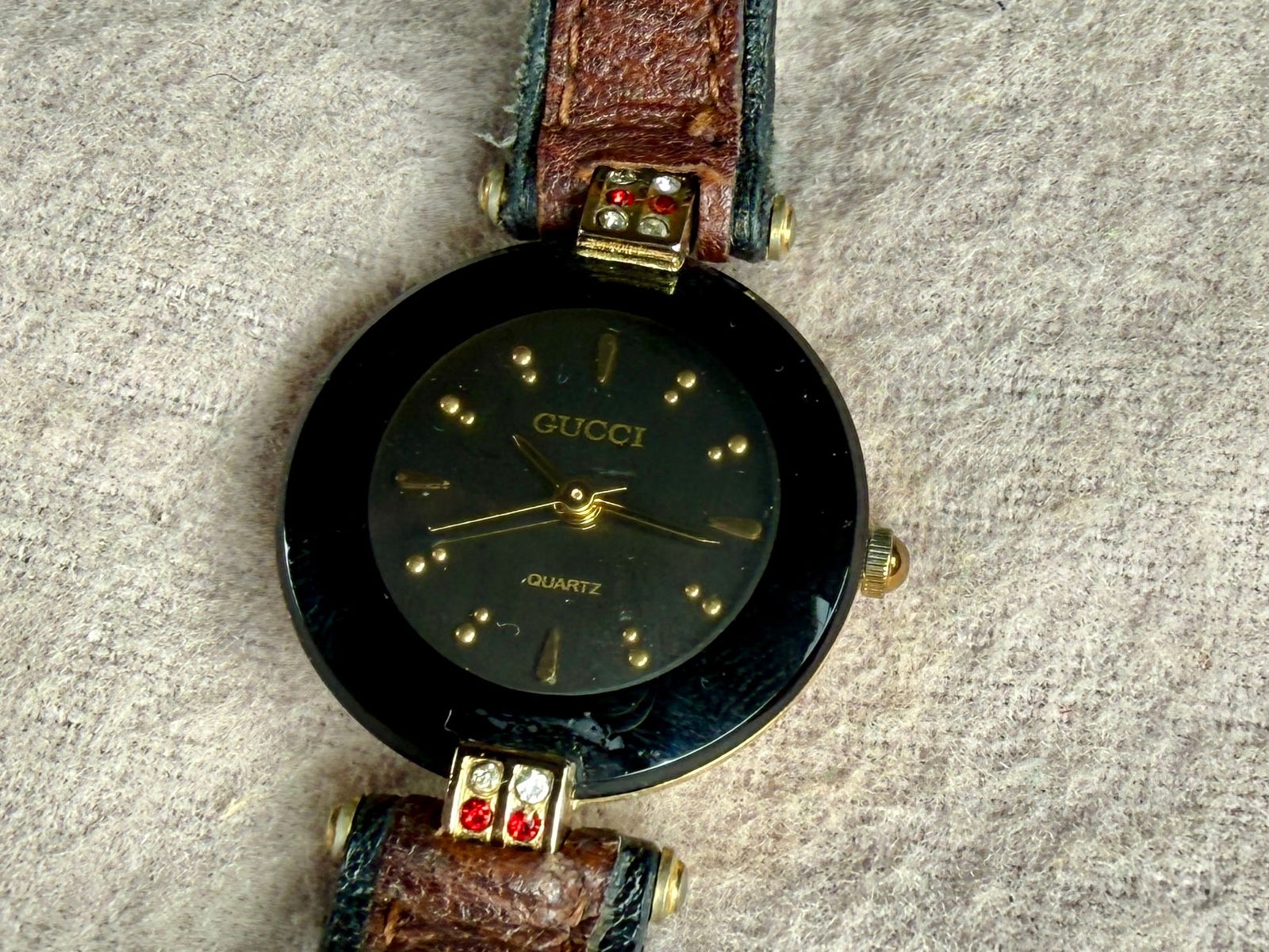 GUCCI, QUARTZ WATCH #2: This lot features Gucci quartz watch with a 24mm case size. Service history unknown and will need a battery at minimum to run.