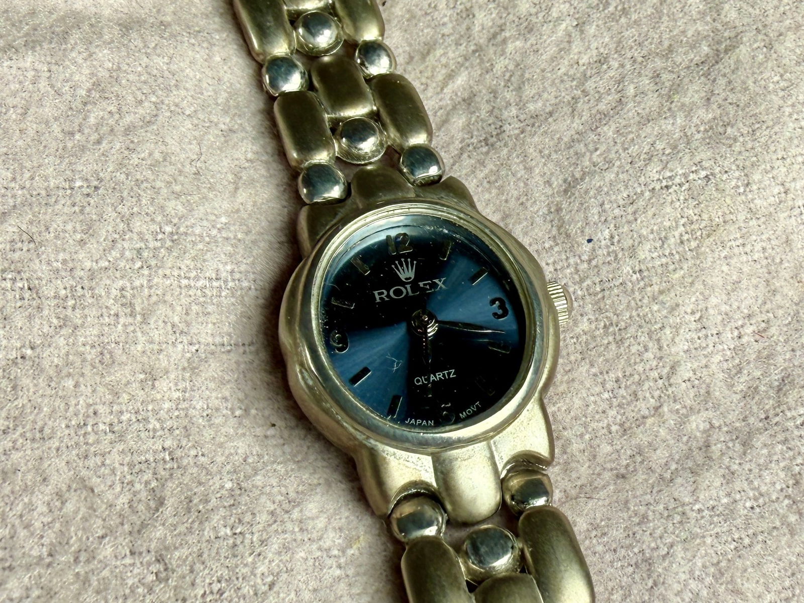 ROLEX, QUARTZ WATCH: This lot features a quartz watch that is labeled Rolex. This watch has no service history, papers, or box and is being sold as (not authenticated). Will need a battery at minimum to run. Comes with ex