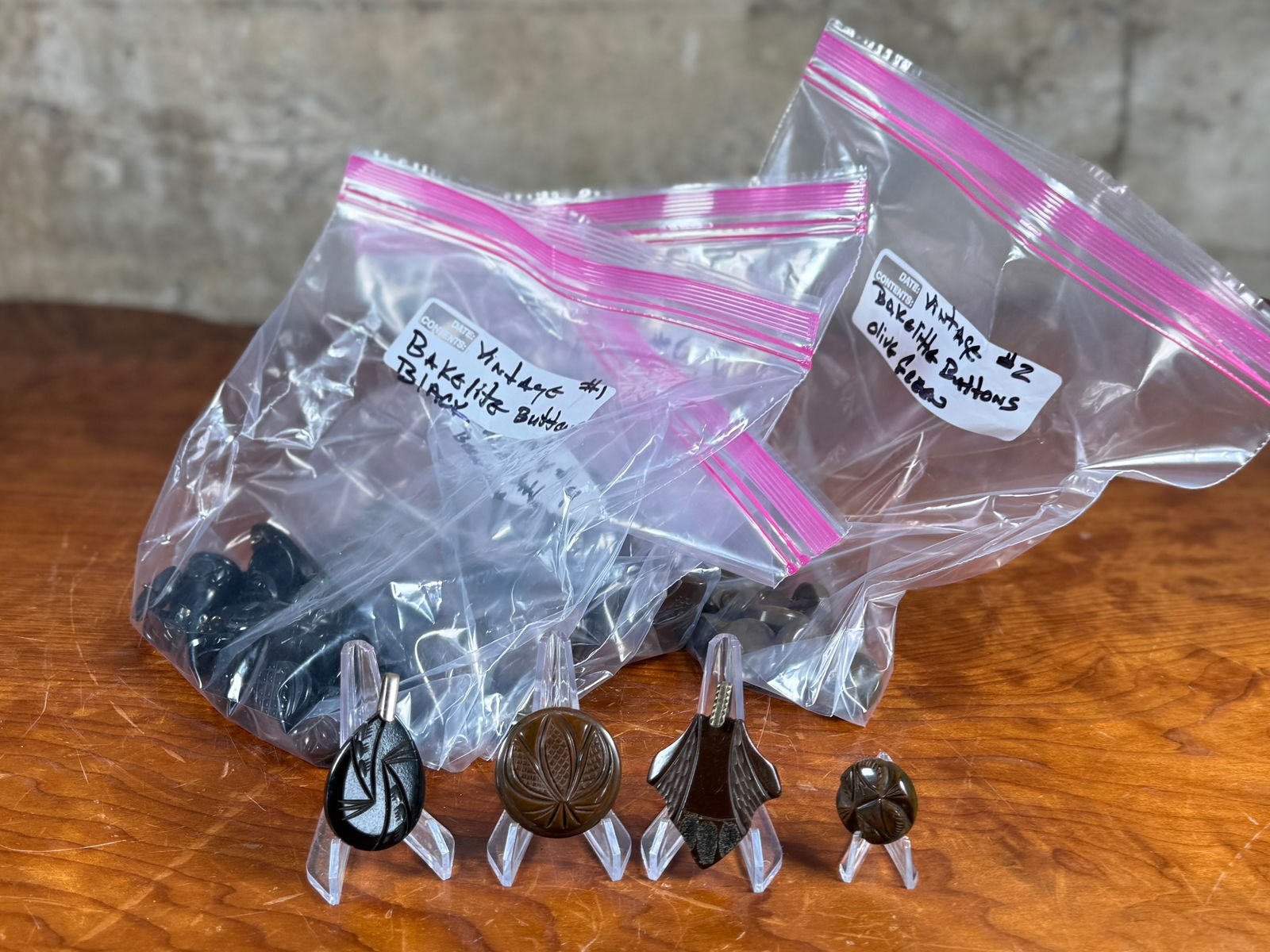 LARGE BAKELITE BUTTON COLLECTION: This lot features a large collection of Bakelite buttons, all neatly organized in five (5) bags.