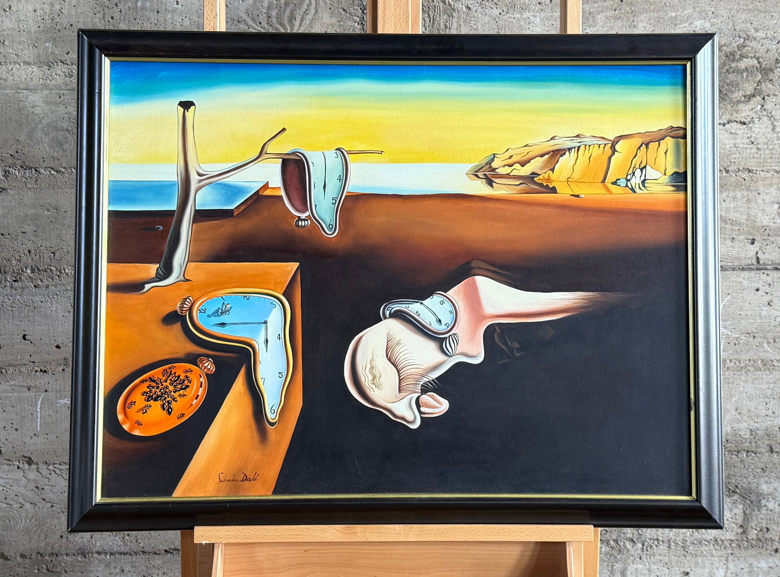 AFTER SALVADOR DALI, 'THE PERSISTENCE OF MEMORY': "The Persistence of Memory", an original painting made in the style of listed artist, Salvador Dali. This piece measures in frame, 27'' H x 35'' W.