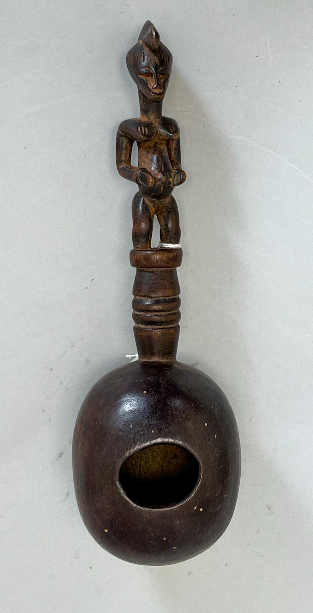 African, Sanufo, Ivory Coast, Carved Wood Cup with Female Figure Handle: Sanufo, Ivory Coast, carved wood cup with female figure Handle, 11"h x 3.5"d PROVENANCE:From the estate of Professor Philip Gould, New York