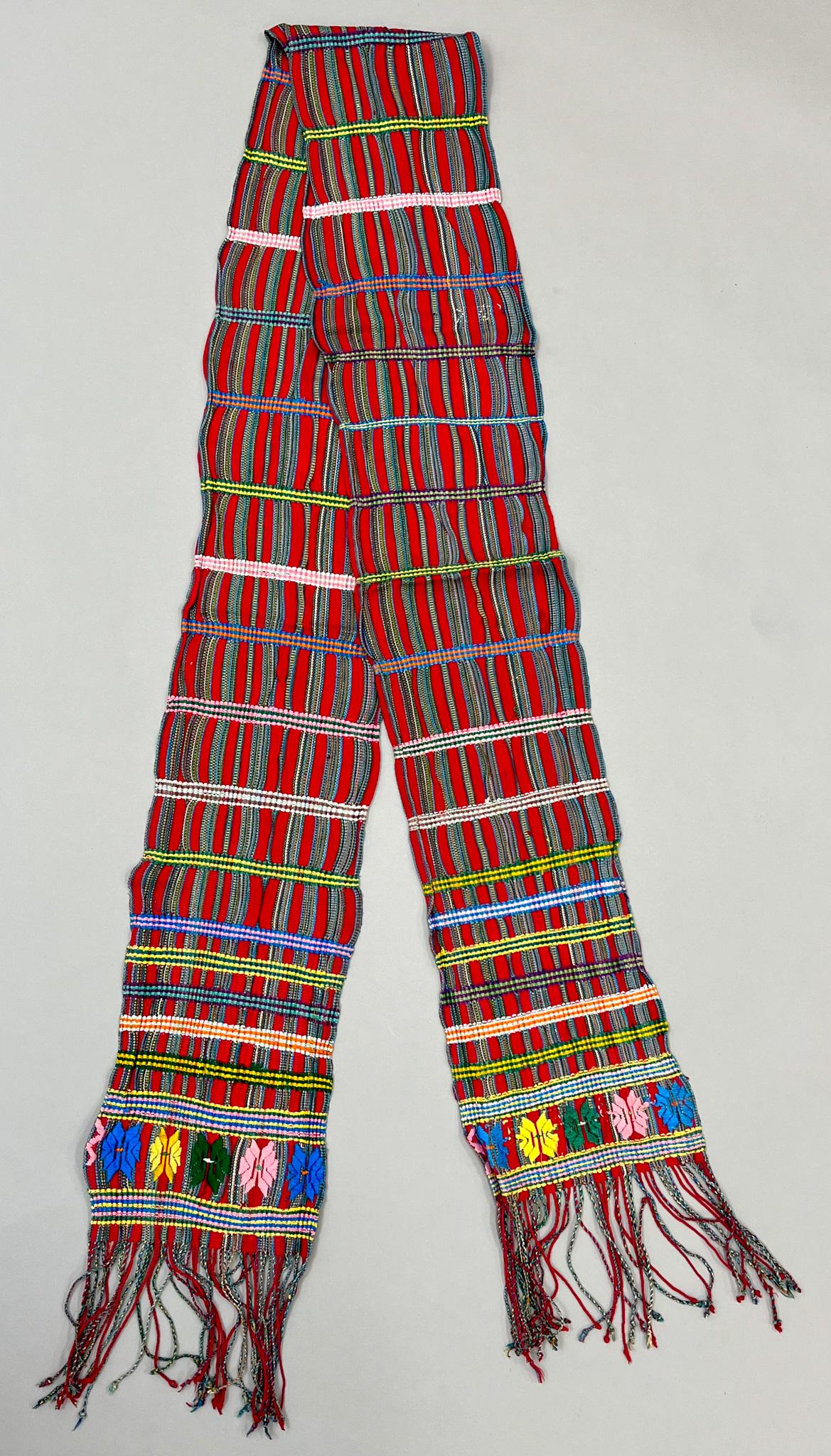 San Pedro Necta, Huehuetenanago, Guatemala, Vintage Woven Cotton Women's "Faja" Belt: San Pedro Necta, Huehuetenanago, Guatemala, vintage woven cotton women's "Faja" belt, traditional red ground with multicolor stripes, and symbolic embroidery pattern, 100"l x 9"w PROVENANCE:From the e