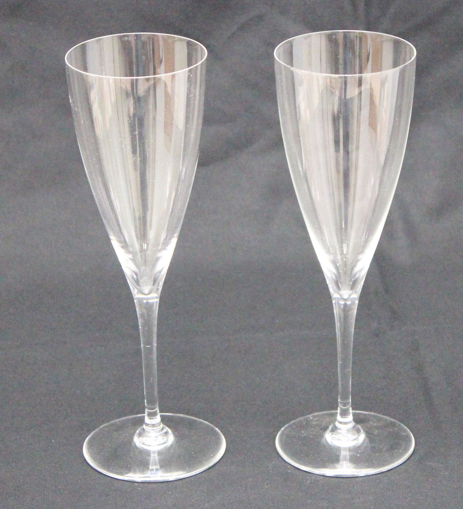 Pair of Baccarat Dom Perignon Water Goblets: Pair of Baccarat Dom Perignon water goblets, acid etched Baccarat France on the bottom, approximately 9"h x 2.75" d