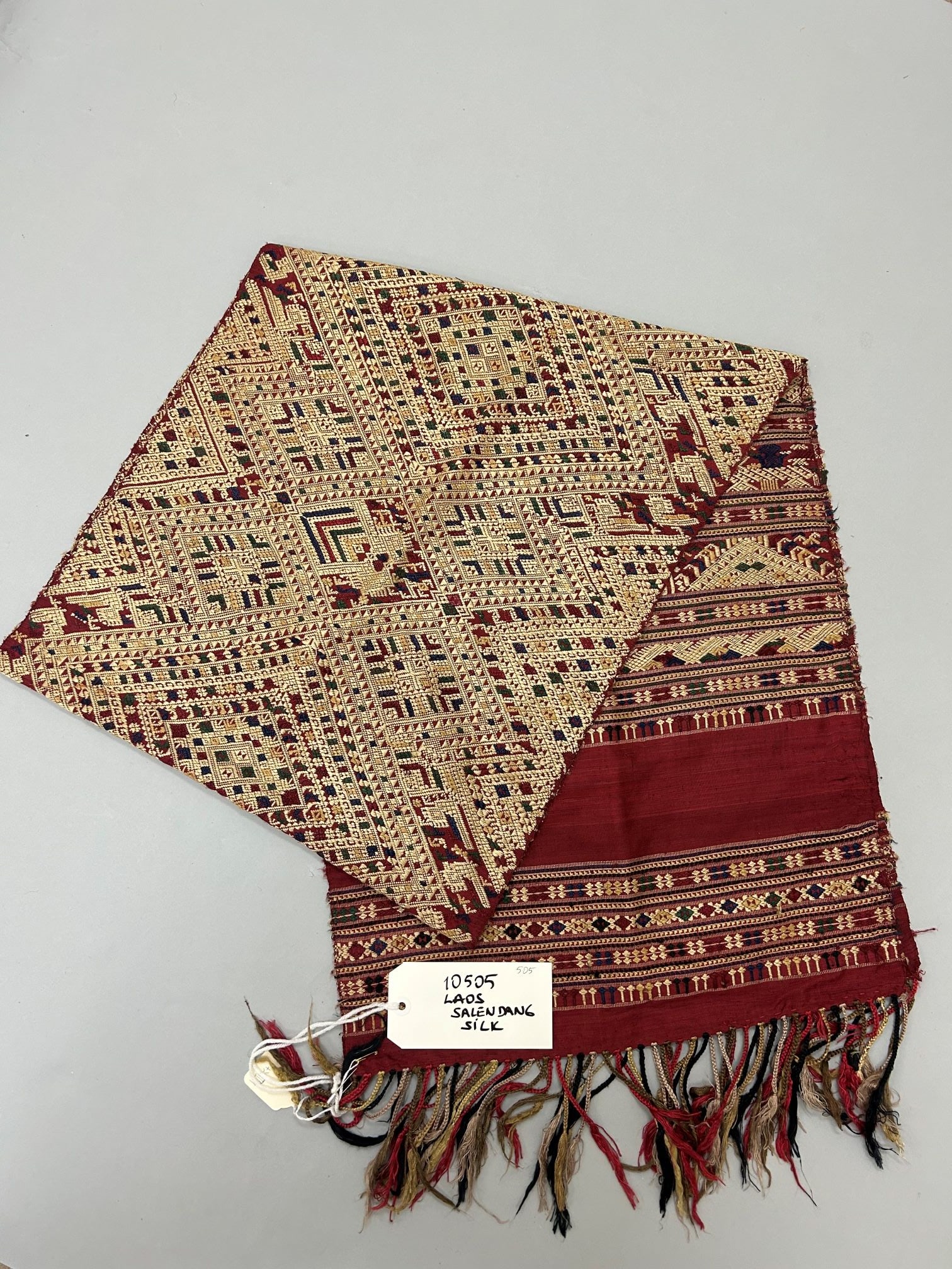 Laos, Handwoven Silk Salendang: Laos, handwoven silk "Salendang" shoulder cloth, 90"l X 18"w (100"l X 18"w with fringes) Provenance: From the Estate of Dr. Philip Gould , New York