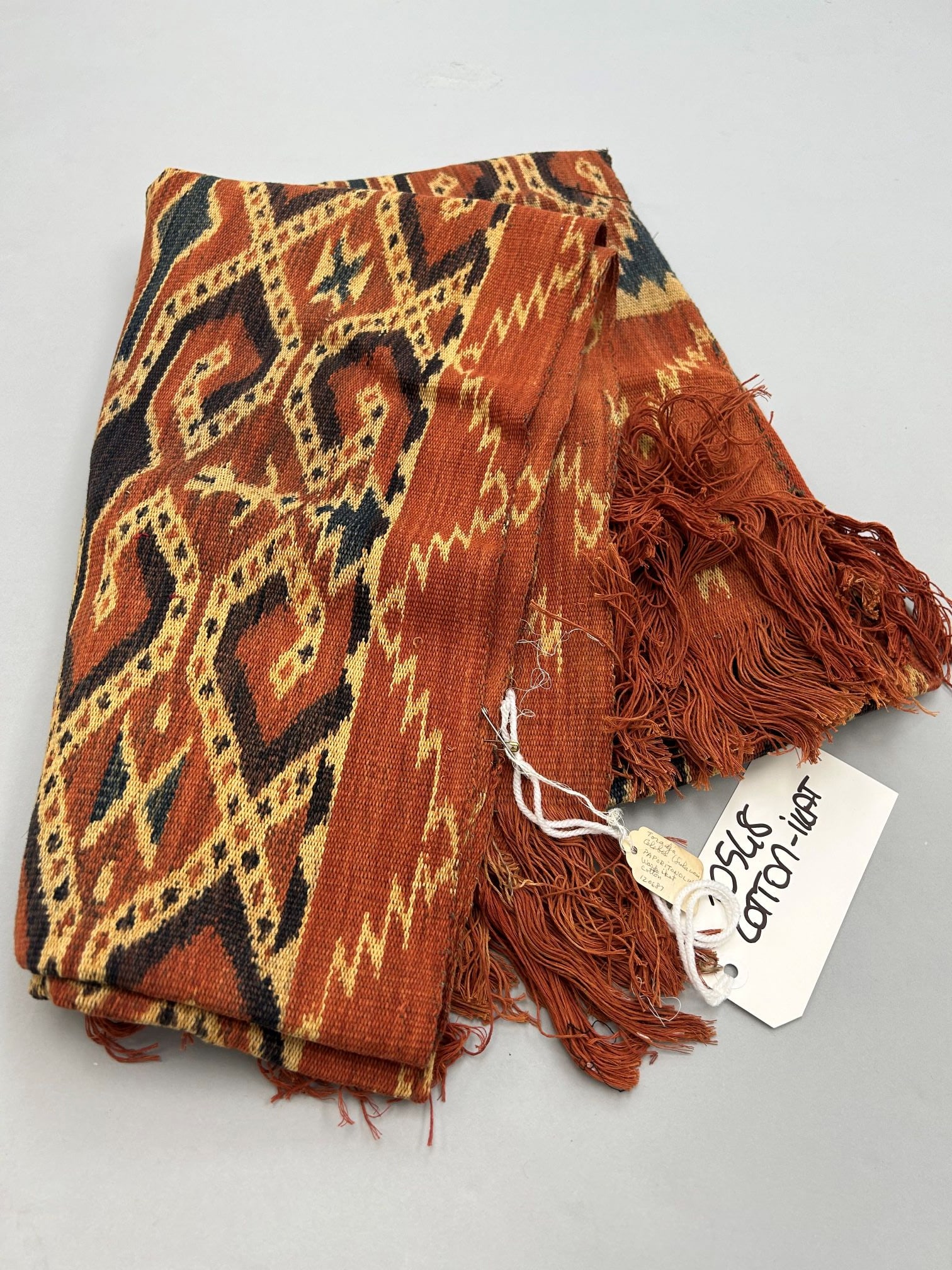 Indonesia, Sulawesi, Torajan people, Ikat Cotton Textile: Indonesia, Sulawesi, Torajan people, ikat cotton textile, 68"l X 48"w Provenance: From the estate of Dr. Philip Gould , New York