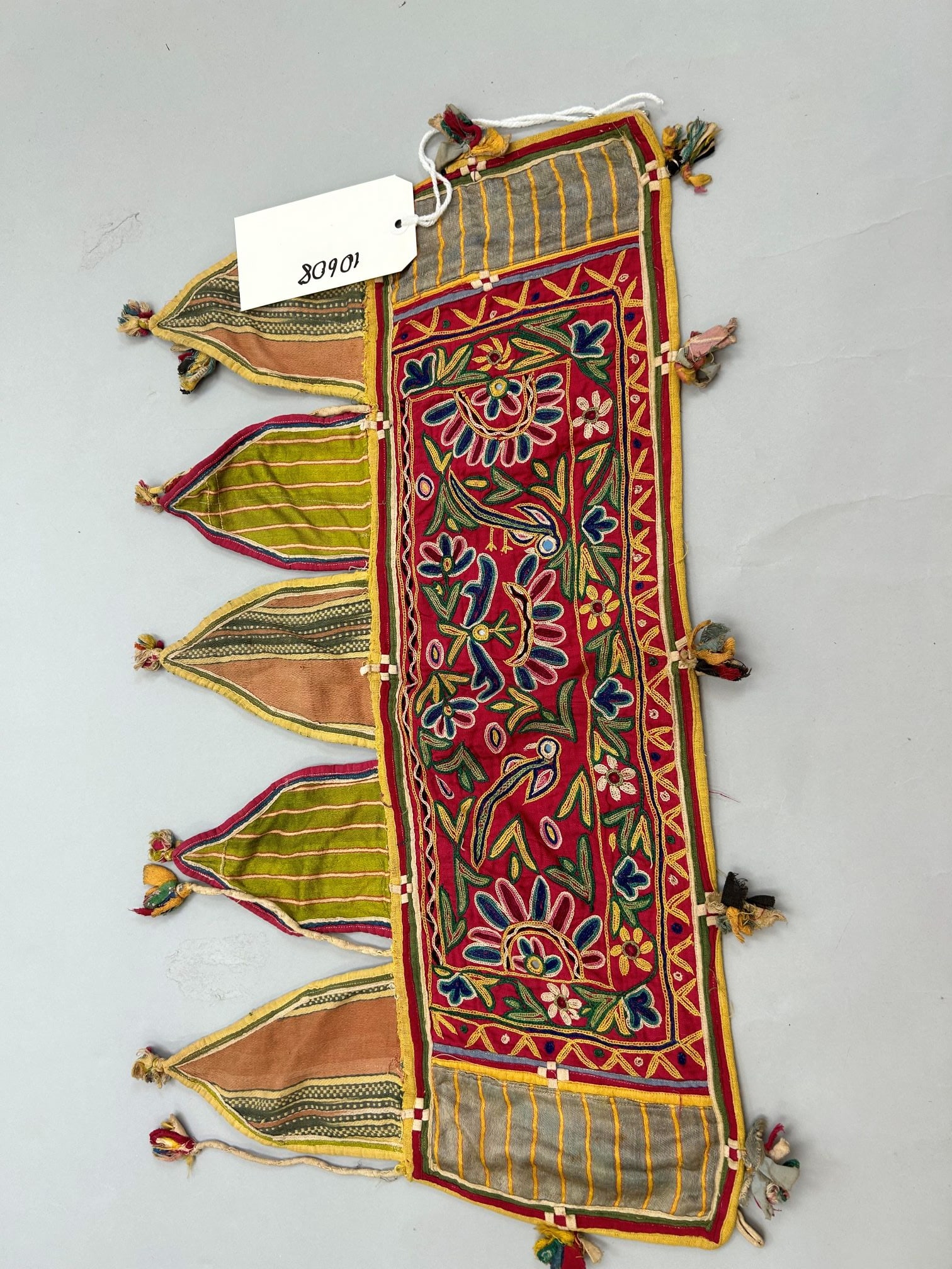 India, Embroidered Cotton and Silk Accessory: India, embroidered cotton and silk accessory, 26"l x 14"w Provenance: From the estate of Dr. Philip Gould , New York