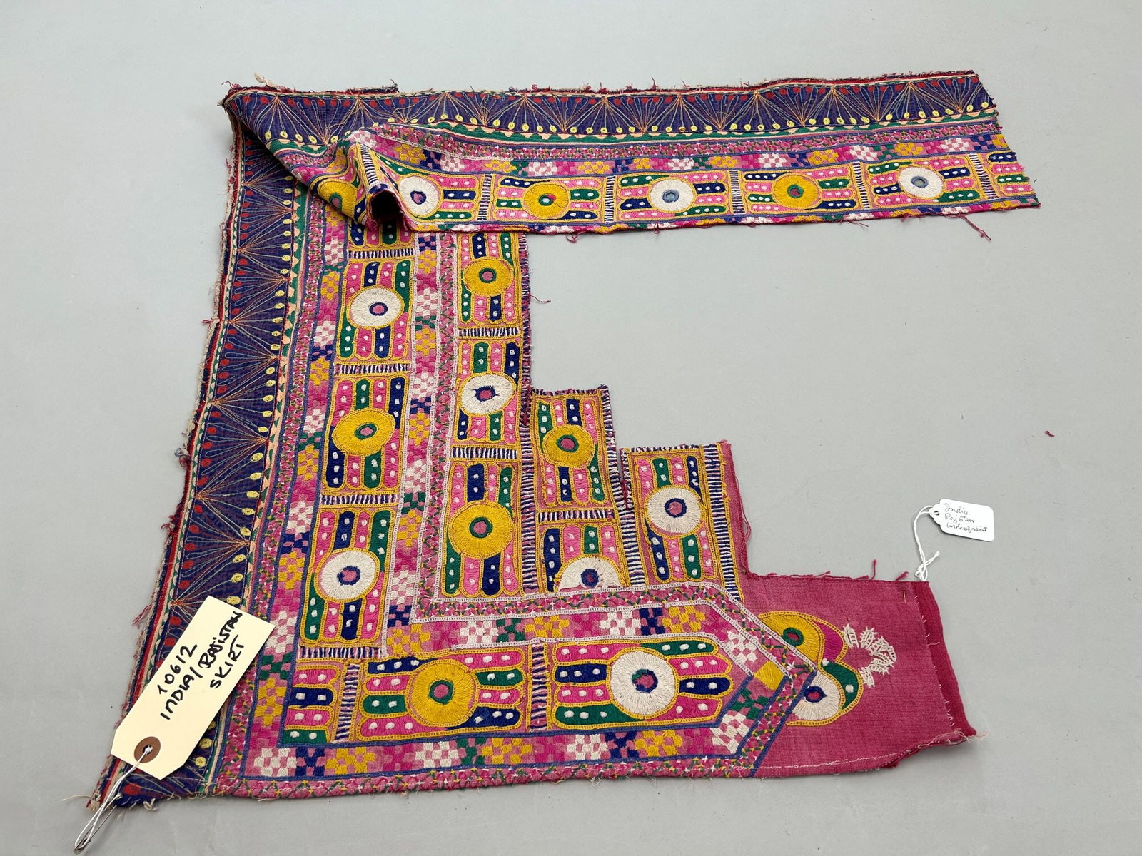 India, Rajasthan, Embroidered Skirt Fragment: India, Rajasthan, embroidered cotton skirt fragment, 54"l x 21"w Provenance: From the estate of Dr. Philip Gould , New York