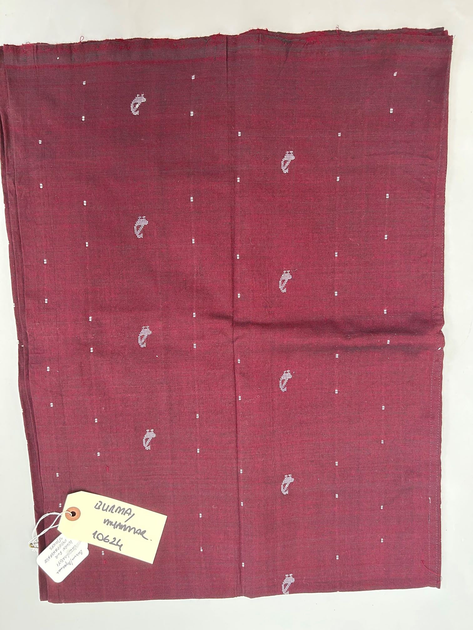 Myanmar, Yaw People Indepence Strike Cotton Maroon Longyi: Myanmar, Yaw People indepence strike cotton maroon color longyi, 45"l x 35"w Provenance: From the estate of Dr. Philip Gould , New York