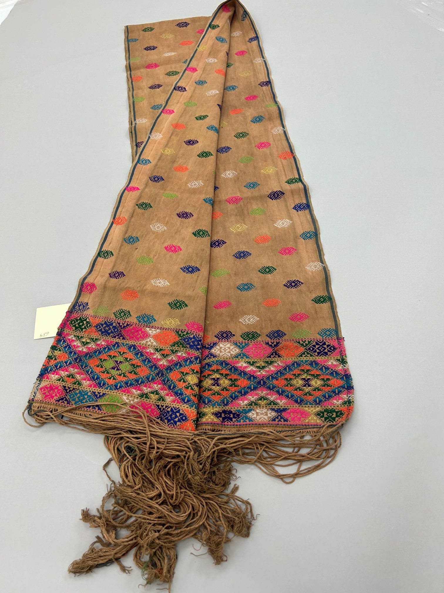 Bhutan, Woven Cotton Sash: Bhutan, woven cotton sash, 80"l x 12"w Provenance: From the estate of Dr. Philip Gould , New York