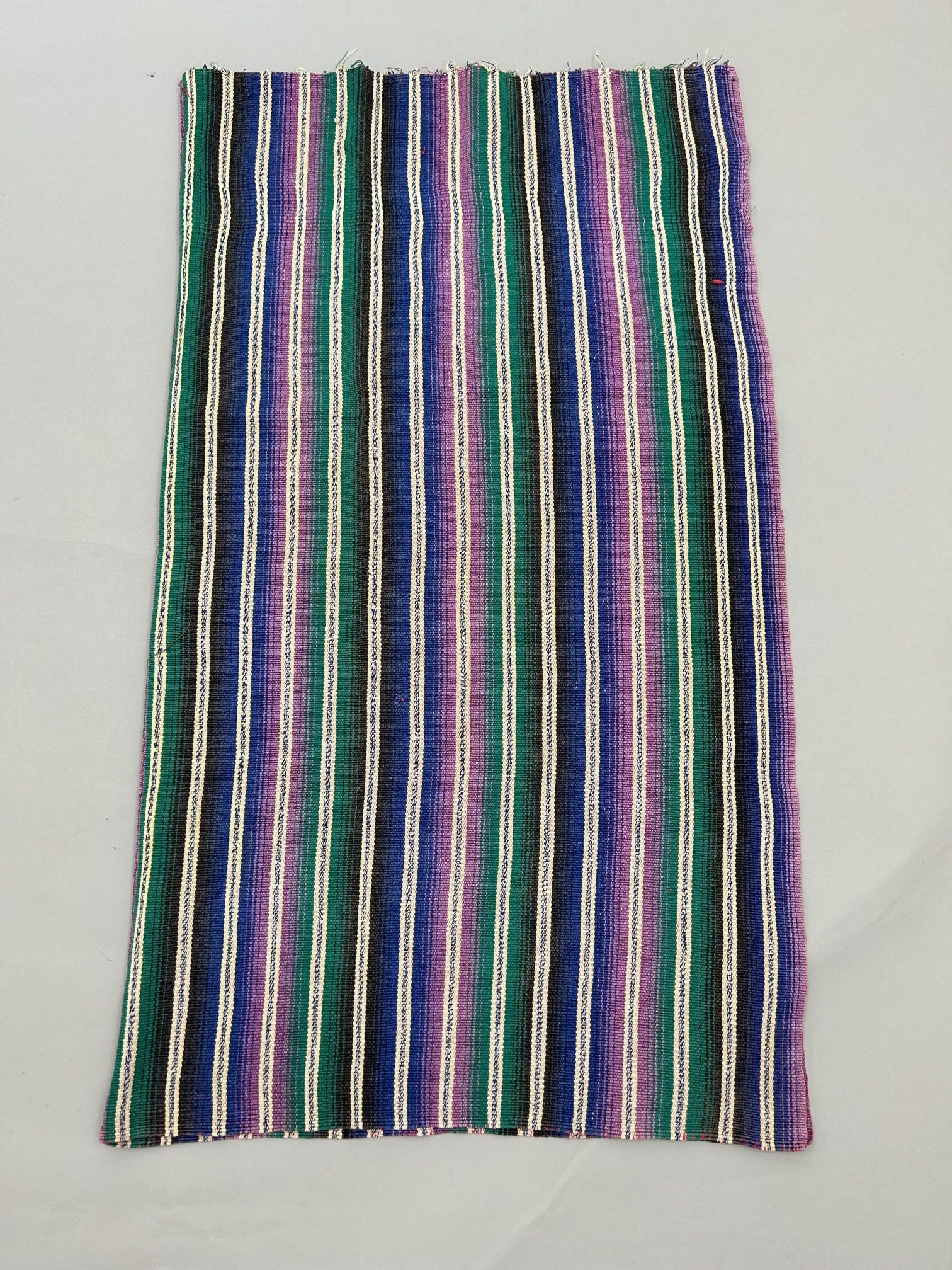 Guatemala, Santiago, Sacatepequez, Color Stripe Cotton Textile: Guatemala, Santiago, Sacatepequez, color stripe cotton textile, 37"l x 32"w Provenance: From the estate of Dr. Philip Gould , New York