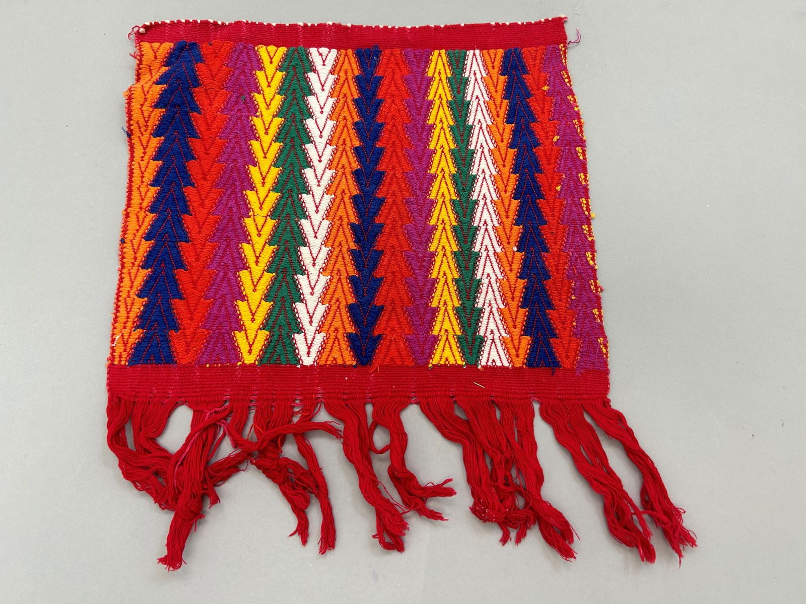 Guatemala, Almolongo, Embroidered Cotton Textile: Guatemala, Almolongo, embroidered cotton textile, 10"l x 12"w Provenance: From the estate of Dr. Philip Gould , New York