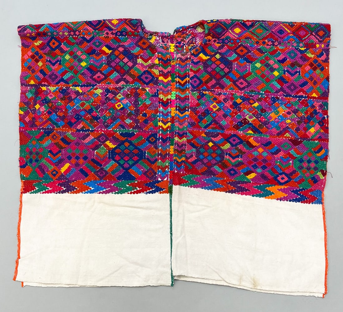 San Jose Nacahuil, Guatemala Department, Guatemala, Vintage Woven Cotton "Huipil" Tunic: San Jose Nacahuil, Guatemala Department, Guatemala, vintage woven cotton "Huipil" tunic, undyed cotton with vibrant multicolor geometric pattern, 26"l x 29'w PROVENANCE:From the estate of Professor Ph